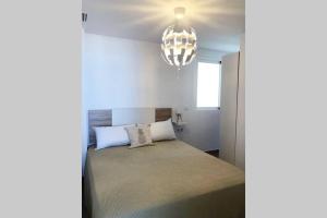 Postel nebo postele na pokoji v ubytování Playa de Gandia 1ere ligne El Galeon