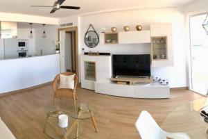 TV a/nebo společenská místnost v ubytování Playa de Gandia 1ere ligne El Galeon