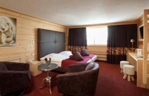 Posezení v ubytování Hotel Les Mélèzes