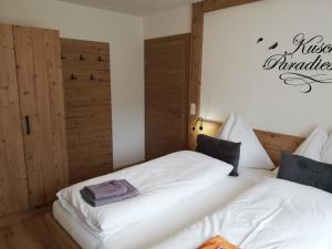 A bed or beds in a room at Appartements Spitaler