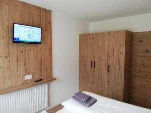 A bed or beds in a room at Appartements Spitaler