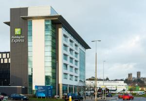 a building with a sign on the side of it at Holiday Inn Express Lincoln City Centre, an IHG Hotel in Lincoln