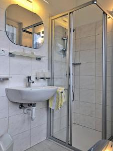 Koupelna v ubytování Pension Planta + 14 fotografií