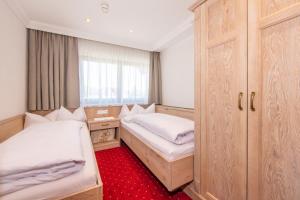 Posteľ alebo postele v izbe v ubytovaní Hotel Serles
