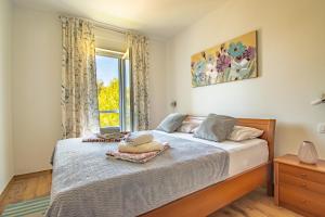 Postel nebo postele na pokoji v ubytování Villa Wiena