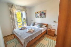 Postel nebo postele na pokoji v ubytování Villa Wiena + 37 fotografií