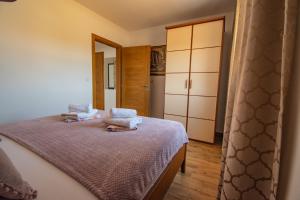 Postel nebo postele na pokoji v ubytování Villa Wiena