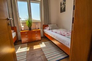 Postel nebo postele na pokoji v ubytování Villa Wiena