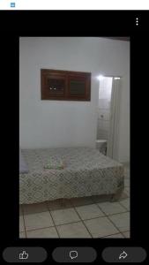 Katil atau katil-katil dalam bilik di Casa Verde de praia de atalaia em Luis Correia Piauí