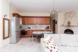 Kuchyň nebo kuchyňský kout v ubytování Villa Y sea view