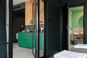 Posteľ alebo postele v izbe v ubytovaní TOP Garden Aparthotel