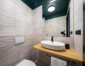 Kúpeľňa v ubytovaní TOP Garden Aparthotel