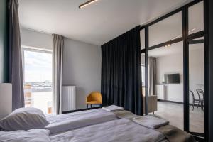 Posteľ alebo postele v izbe v ubytovaní TOP Garden Aparthotel