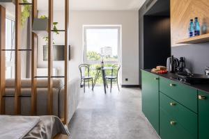 Kuchyňa alebo kuchynka v ubytovaní TOP Garden Aparthotel