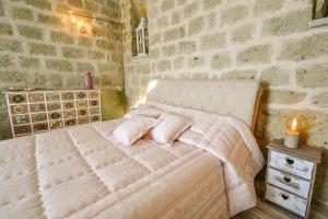 Postel nebo postele na pokoji v ubytování Tenuta C'est la Vie + 37 fotografií