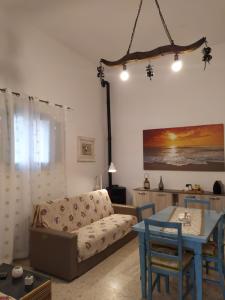 a living room with a couch and a table at Dedo B&B in Terlizzi