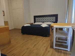 Postel nebo postele na pokoji v ubytování Residenza Punta Stendardo