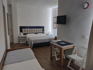 Postel nebo postele na pokoji v ubytování Residenza Punta Stendardo