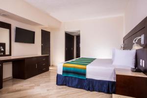 Postel nebo postele na pokoji v ubytování Crown Paradise Club Cancun - All Inclusive