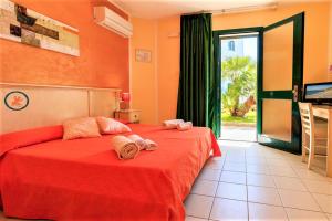 Voodi või voodid majutusasutuse Hotel Ariadimari toas