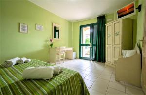 Voodi või voodid majutusasutuse Hotel Ariadimari toas