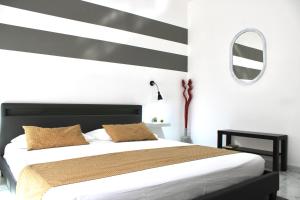 A bed or beds in a room at Apartment Omnia