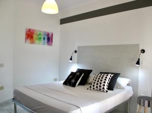 A bed or beds in a room at Apartment Omnia