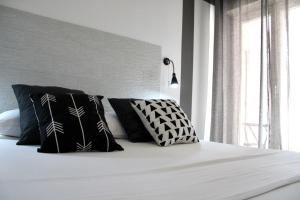 A bed or beds in a room at Apartment Omnia