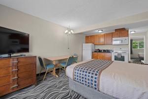 Kuchyň nebo kuchyňský kout v ubytování Astoria Rivershore Motel