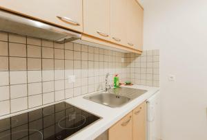 Η κουζίνα ή μικρή κουζίνα στο Tommys House +30 φωτογραφίες