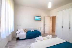 Voodi või voodid majutusasutuse Hotel Ariadimari toas