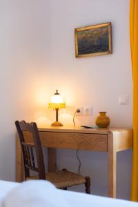 A bed or beds in a room at Margado