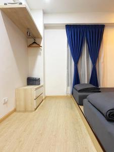 Postel nebo postele na pokoji v ubytování Amadel Residence 爱媄德民宿 13 + 24 fotografií