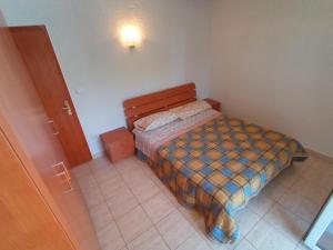 Postel nebo postele na pokoji v ubytování ANKARAN SOBE MARA