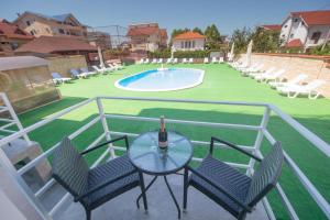 Bazén v ubytování Hotel Olguta nebo v jeho okolí