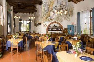 Restaurant o un lloc per menjar a Hotel Residence Sant'Uberto