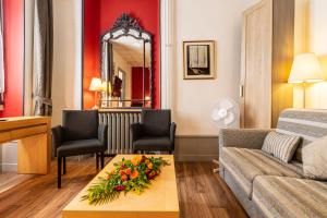 Posezení v ubytování Hôtel des Bains