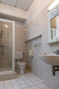 Koupelna v ubytování Hôtel des Bains