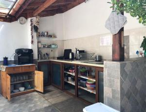 a kitchen with a counter and a counter top at Sarievi Holiday Home in Tsarevo