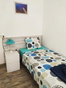 Postel nebo postele na pokoji v ubytování Apartments Tazacorte Beach 2-3 floor