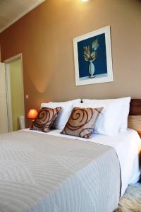 A bed or beds in a room at Kleanthi's House