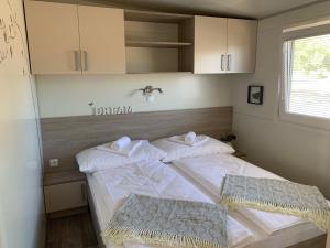 a bedroom with two beds in a room at Mobile Home M&M in Drage