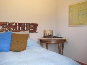 מיטה או מיטות בחדר ב-Charming house in a finca