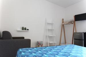 TV a/nebo společenská místnost v ubytování Acquachiara Rooms