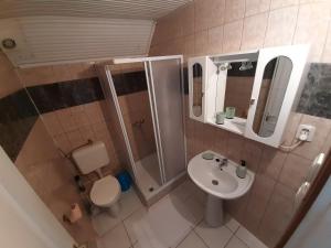 Koupelna v ubytování Timbi Vendégház