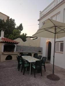 Patio alebo iná vonkajšia časť ubytovania Smještajni objekt Padovan