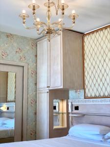 Postel nebo postele na pokoji v ubytování Hotel Flamingo