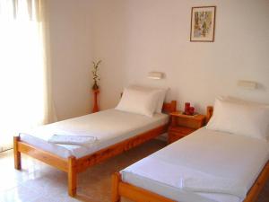 Кровать или кровати в номере Rantos Apartments