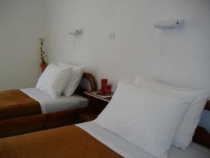 Кровать или кровати в номере Rantos Apartments