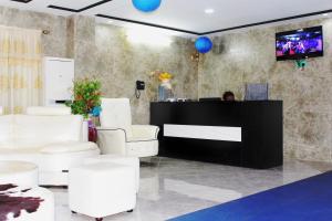 TV a/nebo společenská místnost v ubytování Nora Hotel